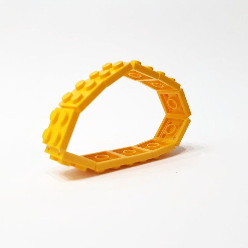 Yellow elastic bangle made from lego bricks