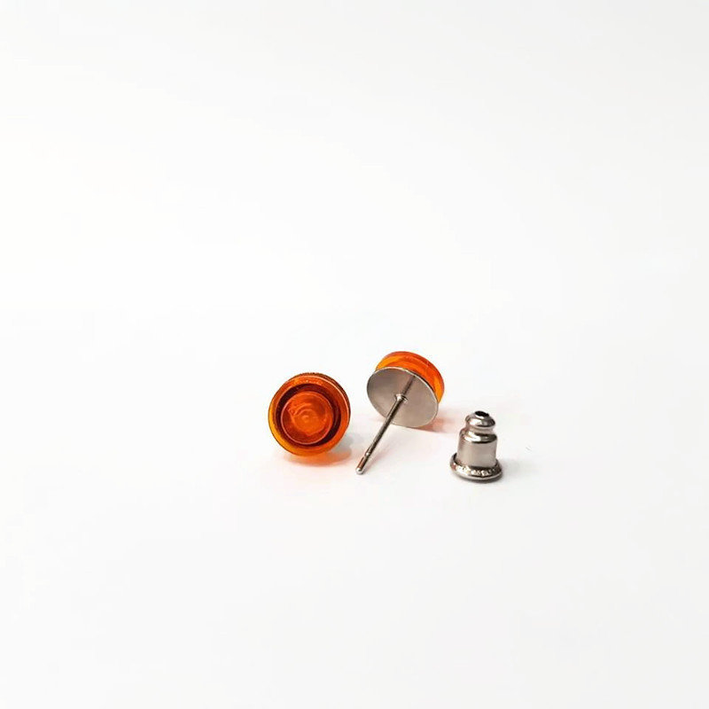 Orange stud earrings made from lego bricks
