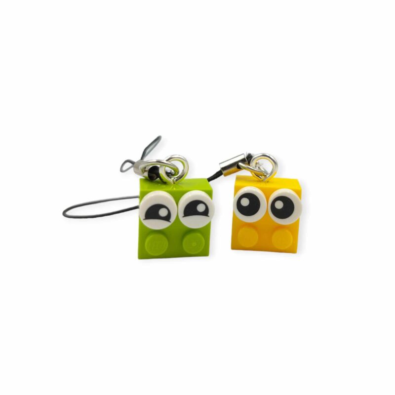 Funny eye brick zipper pulls, a pair of one lime and one yellow